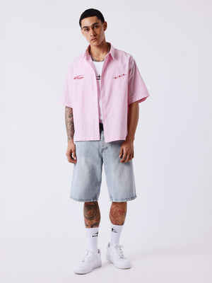 Project X Paris Chemise courte ample à fines rayures rose