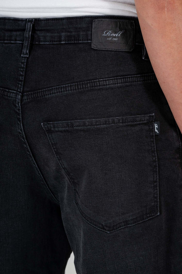 Reell-Solid-Jeans-black-wash-Model-Close-Up-Back-Pocket