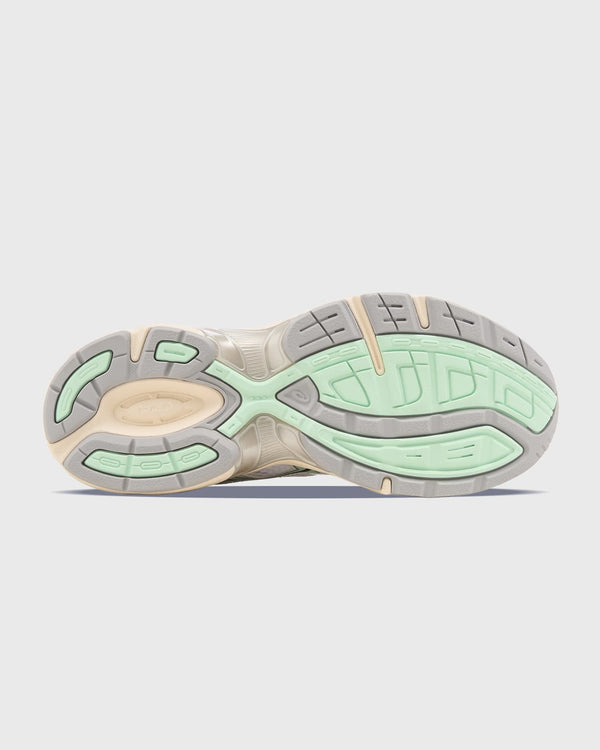 Asics Gel-1130 Sneaker Wit Mint zool, met een witte achtergrond