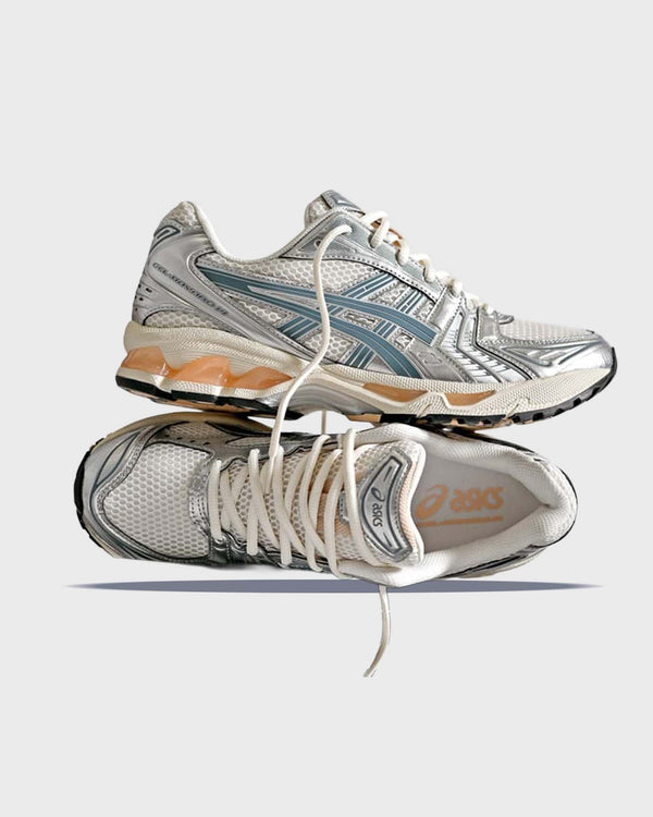 Asics Gel-Kayano 14 Sneaker Wit / Oranje zij en bovenaanzicht