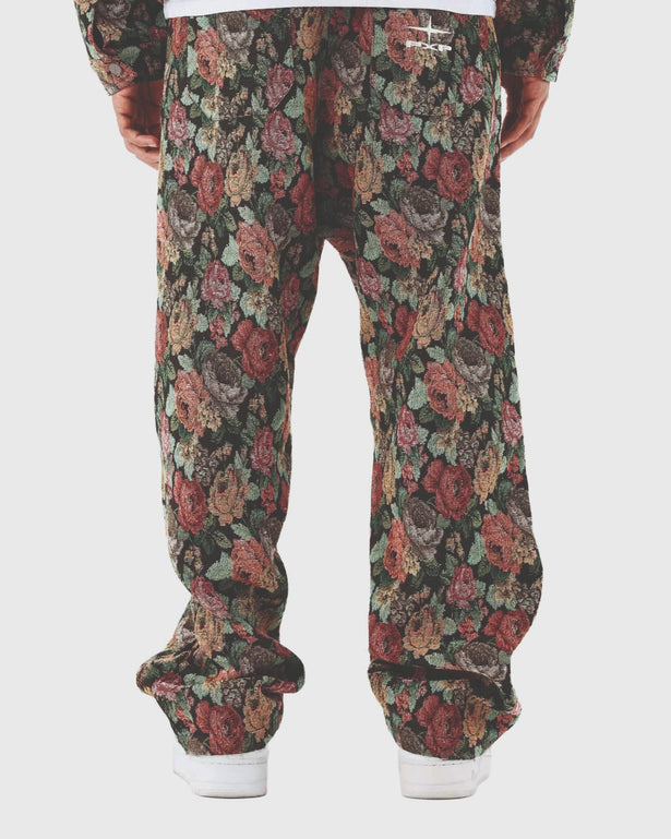  achteraanzicht  bloemen patern broek logo project x paria