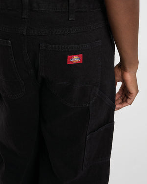 Dickies 998 Baggy Barrel Carpenter Lange Broek Zwart close up dickies label achterkant rood