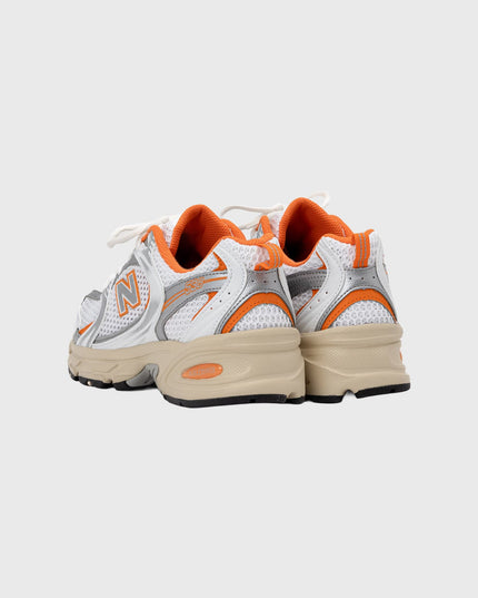 New balance 530 EB oranje paar achterkant