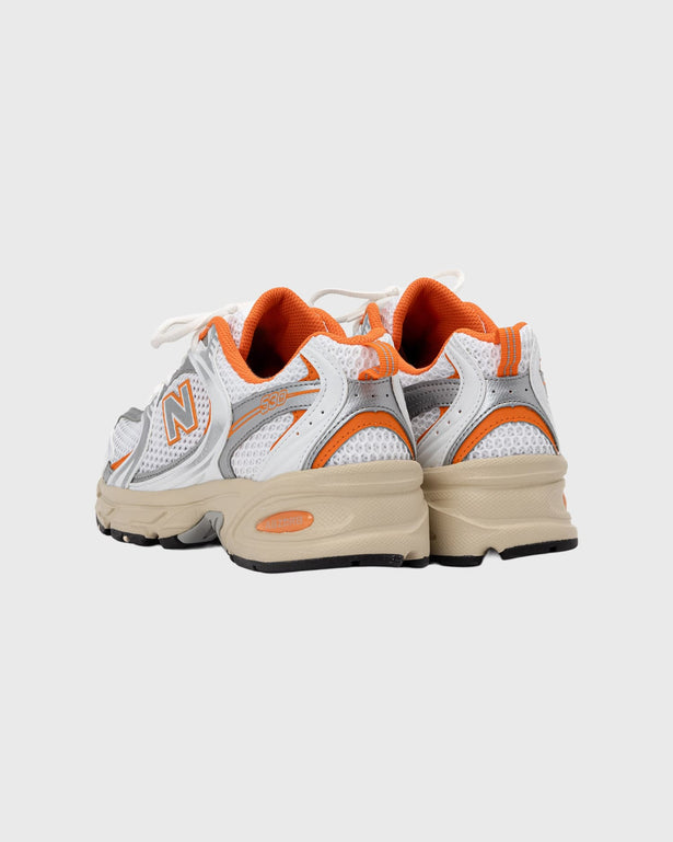 New balance 530 EB oranje paar achterkant