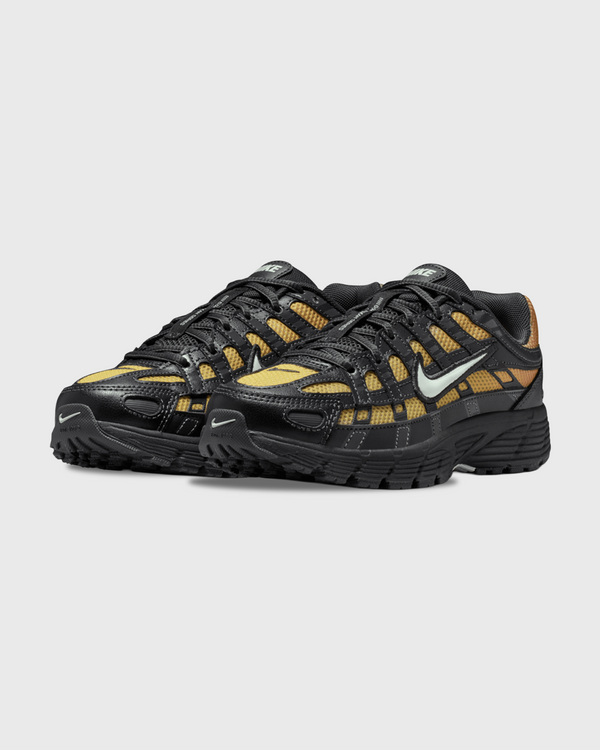 Nike P-6000 Zwart Oranje Geel Fade buitenaanzicht voorkant