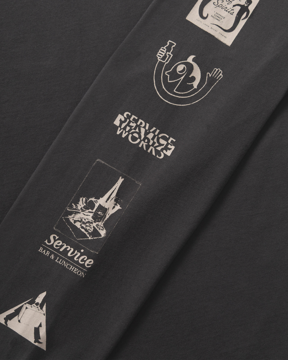 Service Works Bootleg Longsleeve Tee Charcoal voorkant grijs print op de mouwen