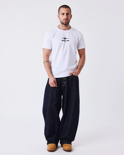Project X Paris Essentials Baggy Jeans Denimblauw, gedragen door een model.