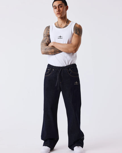 Project X Paris Snow Wide-Leg Jeans Ruwe Denim, gedragen door een model.