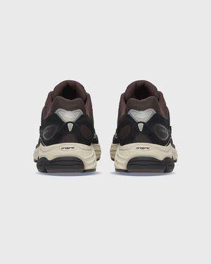 Saucony ProGrid Omni 9 Sneaker Bruin / Zwart achteraanzicht 